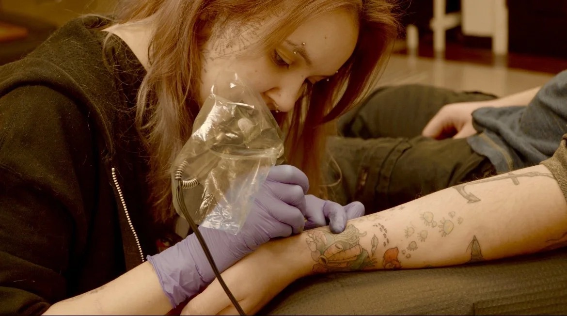 Melody tattooing at Rabbit's Paw