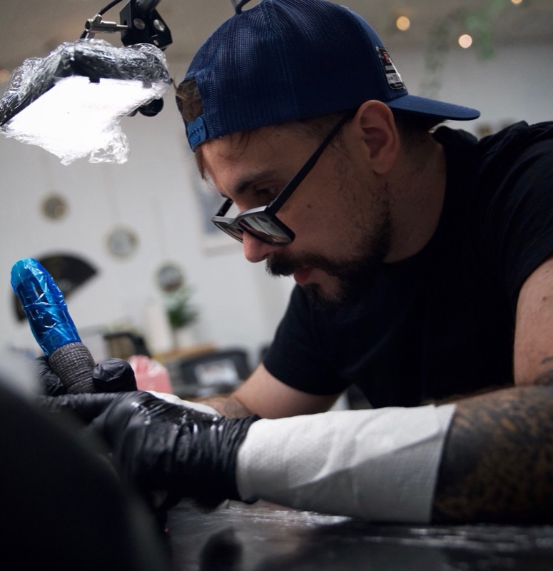 Tony (Argento Tattoos) tattooing at Rabbit's Paw Tattoo