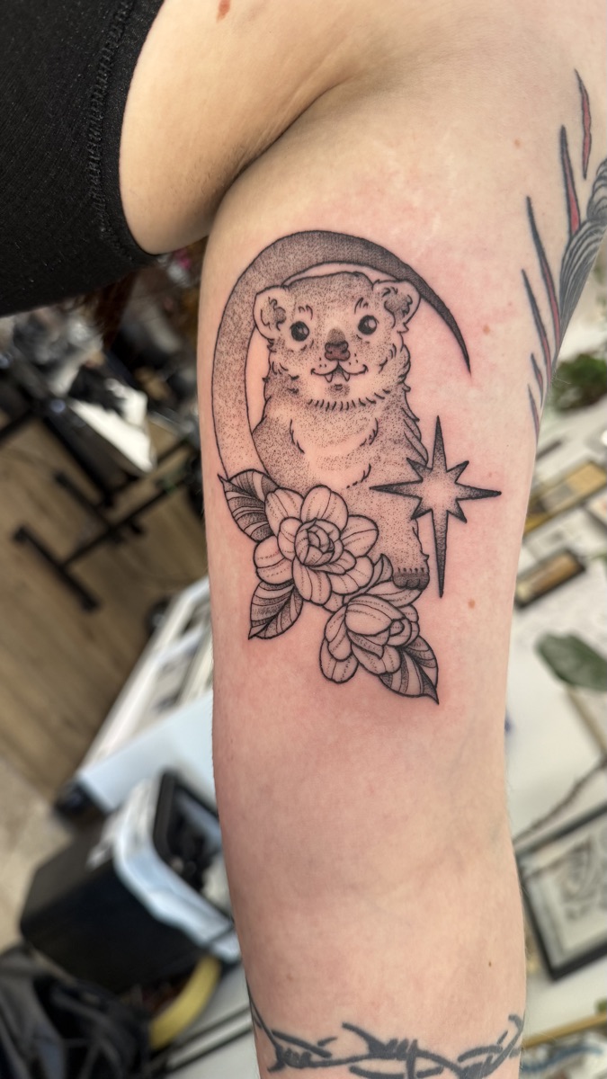 Playful animal tattoo by Cat Bernardy