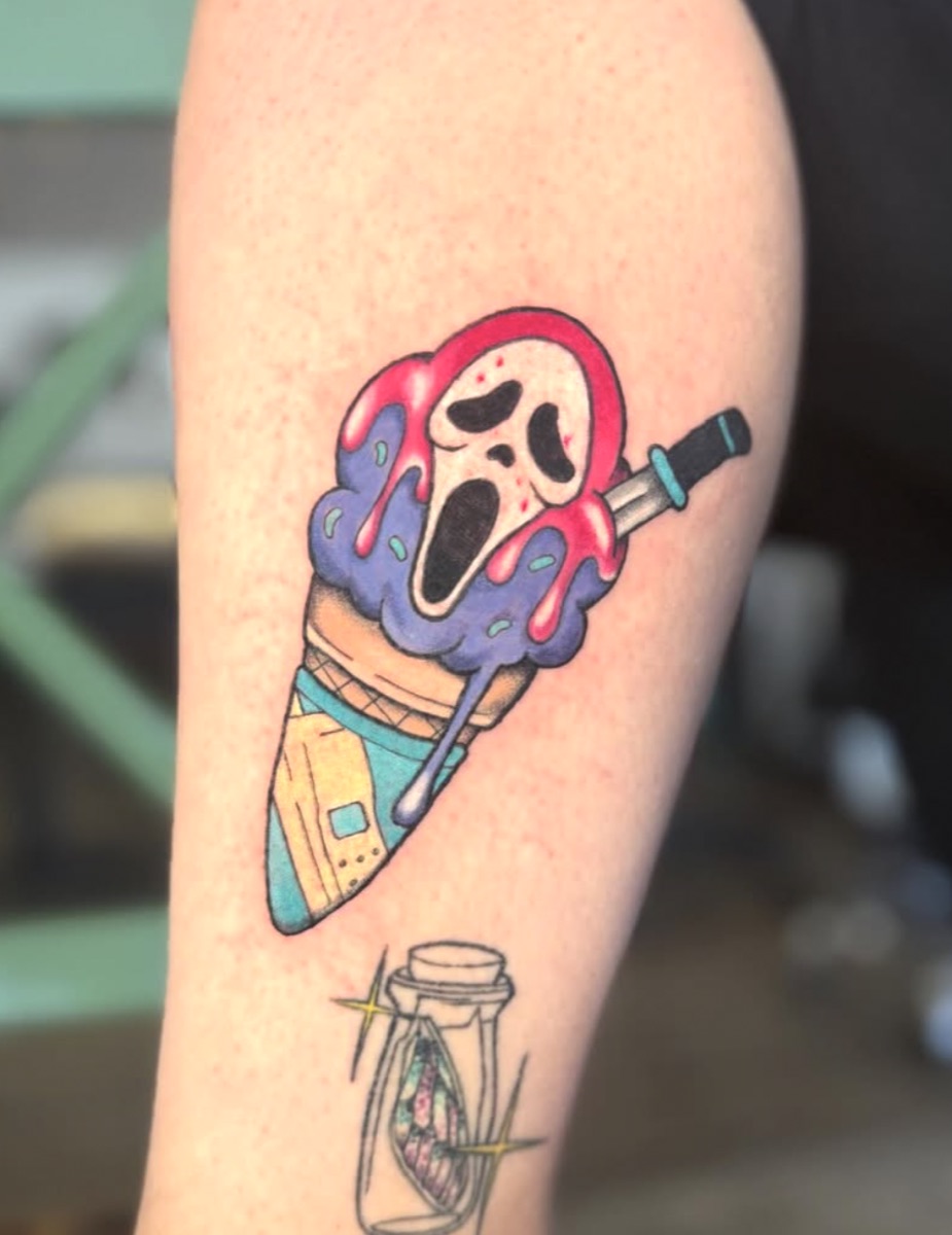 Ghostface ice cream cone — playful horror-movie tattoo by Cat Bernardy