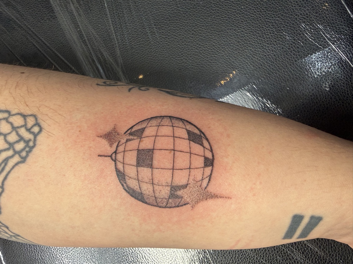 Disco ball tattoo by Cat Bernardy